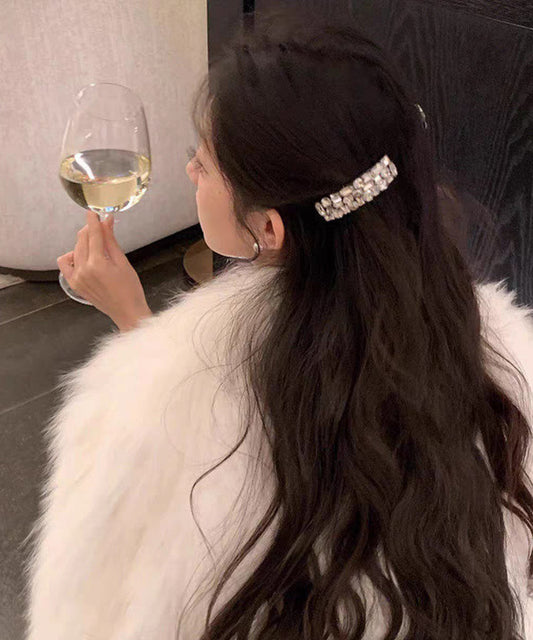 Horquilla de circonita y acrílico blanco de moda