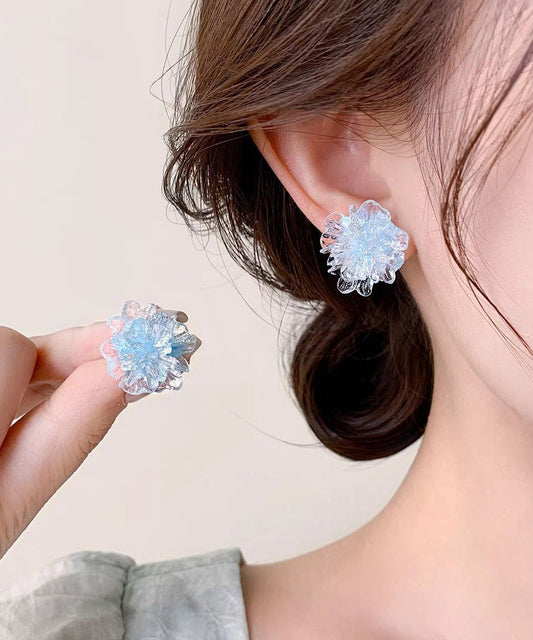 Pendientes de botón con diseño original de flores en acrílico azul
